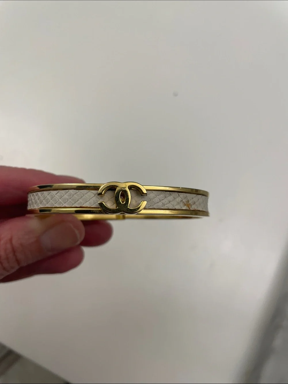 CHANEL vintage Gold and White CC Logo Leather-Trim Bangle Bracelet